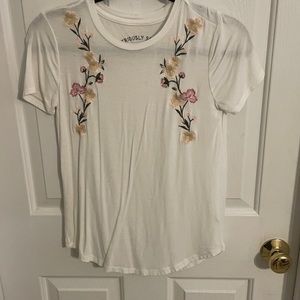 white shirt with flow embroidery